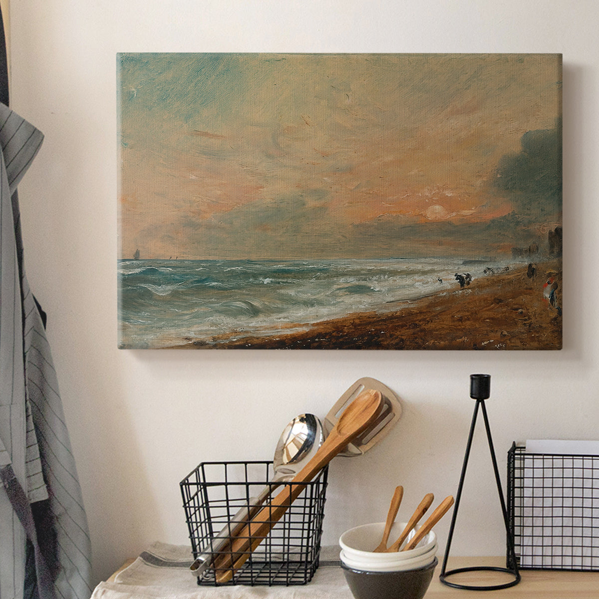 Canvas art print detailing a natural beach landscape with soft movement, displayed in a softly lit workspace setting