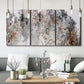 Three-panel canvas wall art featuring wooded trail through forest, displayed in a modern living room above seating.