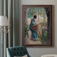 Impressionist portrait of Madame Monet sewing by Claude Monet in an ornate bronzed mahogany wood frame displayed in a dark-toned interior setting.