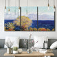 Three-panel canvas wall art featuring mediterranean coastline with headland, displayed in a modern living room above seating.