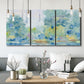 Three-panel canvas wall art featuring quiet abstract morning landscape, displayed in a modern living room above seating.