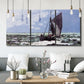 Three-panel canvas wall art featuring stormy sea with crashing waves, displayed in a modern living room above seating.