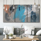 Three-panel canvas wall art featuring playful abstract mark making, displayed in a modern living room above seating.