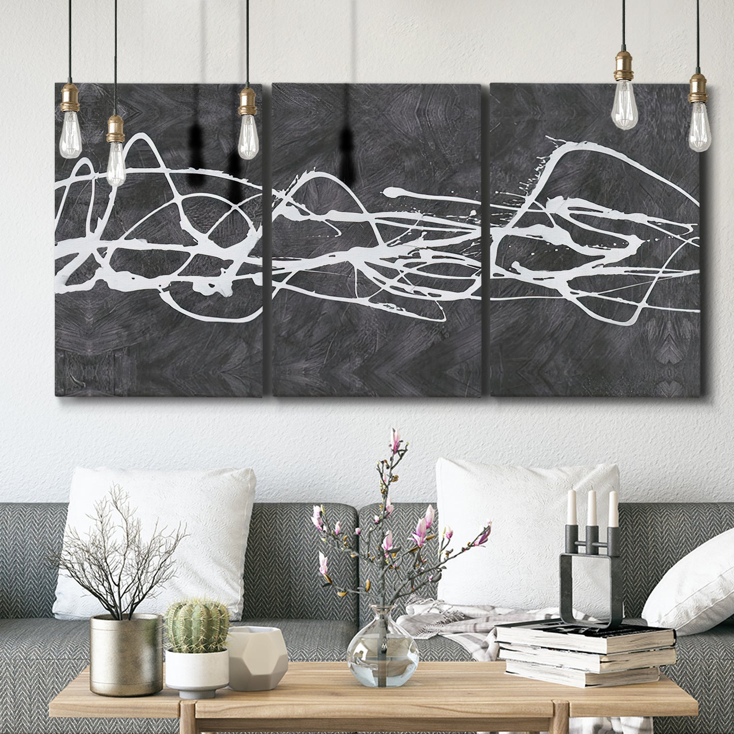 Three-panel canvas wall art featuring minimal abstract frequency lines, displayed in a modern living room above seating.