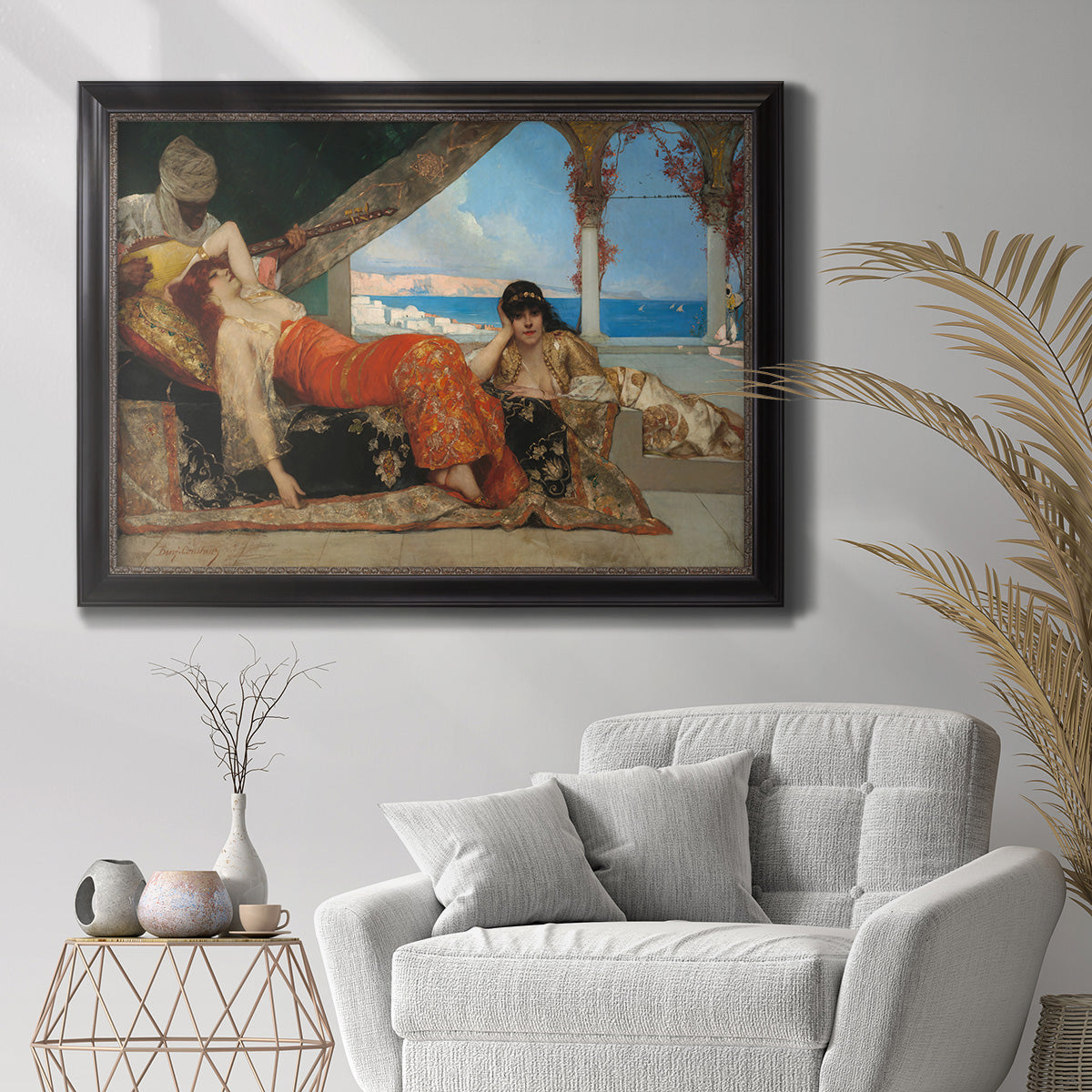 Orientalist portrait scene by Jean-Joseph Benjamin-Constant in an ornate black frame with gilded inner detail displayed in a bright interior setting.
