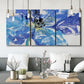 Three-panel canvas wall art featuring blue floral botanical close up, displayed in a modern living room above seating.