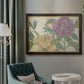 Contemporary peony flower illustration in an ornate mahogany wood frame with gold liner displayed in a neutral interior setting.