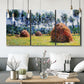 Three-panel canvas wall art featuring harvested grainstacks in field, displayed in a modern living room above seating.