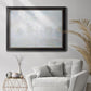 Impressionist atmospheric landscape in morning haze by Claude Monet in an ornate black frame with gilded inner detail displayed in a bright interior setting.
