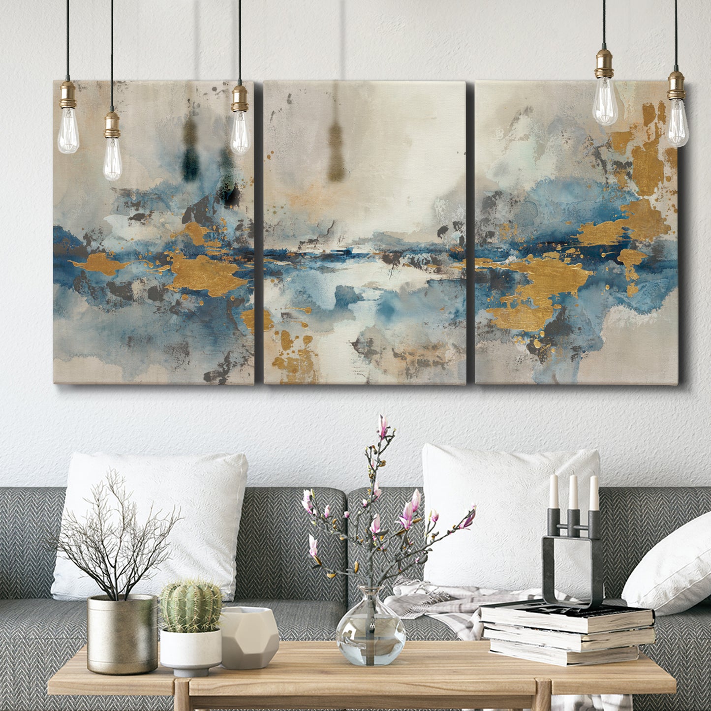 Three-panel canvas wall art featuring abstract soft morning light, displayed in a modern living room above seating.