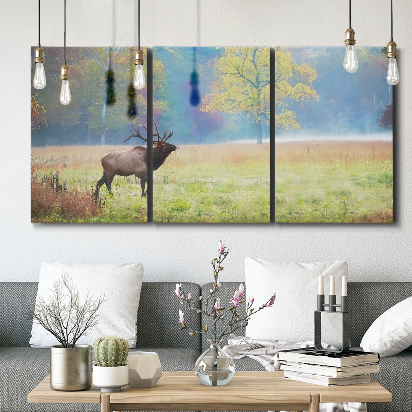 Three-panel canvas wall art featuring resting animals in open field, displayed in a modern living room above seating.