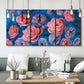 Three-panel canvas wall art featuring layered botanical petal abstractions, displayed in a modern living room above seating.