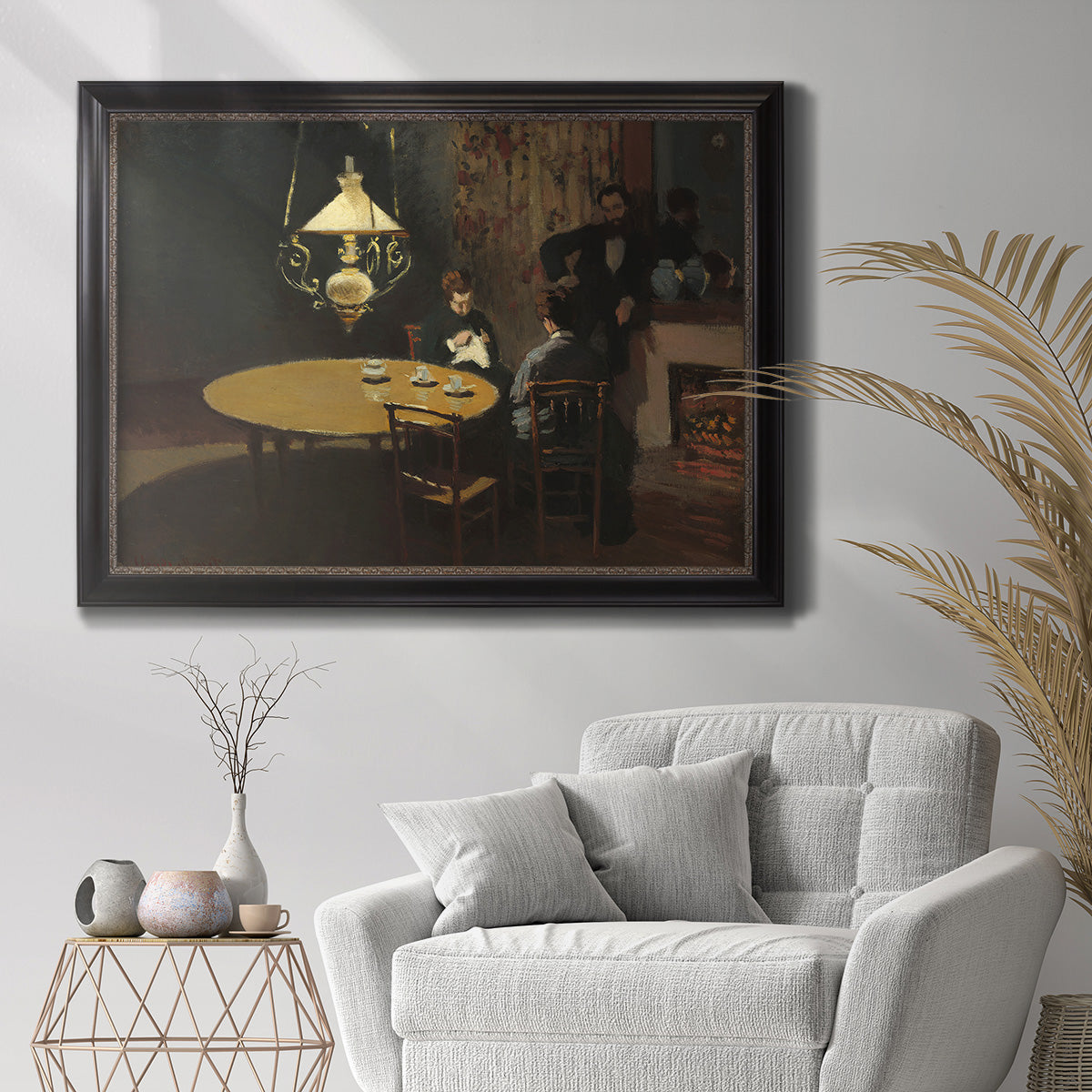 Impressionist domestic interior scene by Claude Monet in an ornate black frame with gilded inner detail displayed in a bright interior setting.