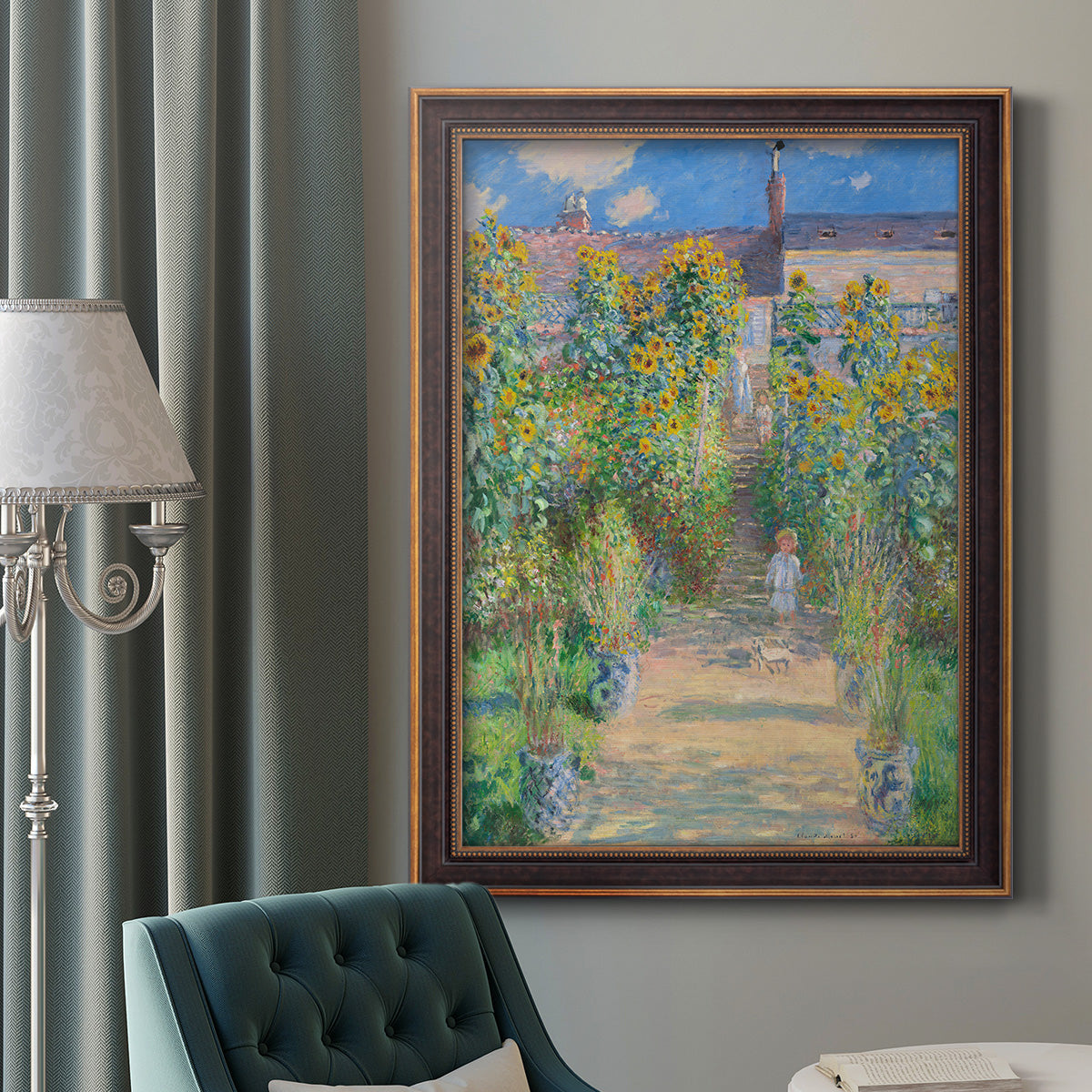 Impressionist garden landscape painting by Claude Monet in an ornate bronzed mahogany wood frame displayed in a dark-toned interior setting.
