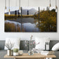 Three-panel canvas wall art featuring low light river photography, displayed in a modern living room above seating.