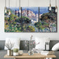 Three-panel canvas wall art featuring coastal hillside overlooking monaco, displayed in a modern living room above seating.