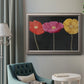 Contemporary poppy flower artwork in an ornate vintage silver frame displayed in a neutral interior setting.