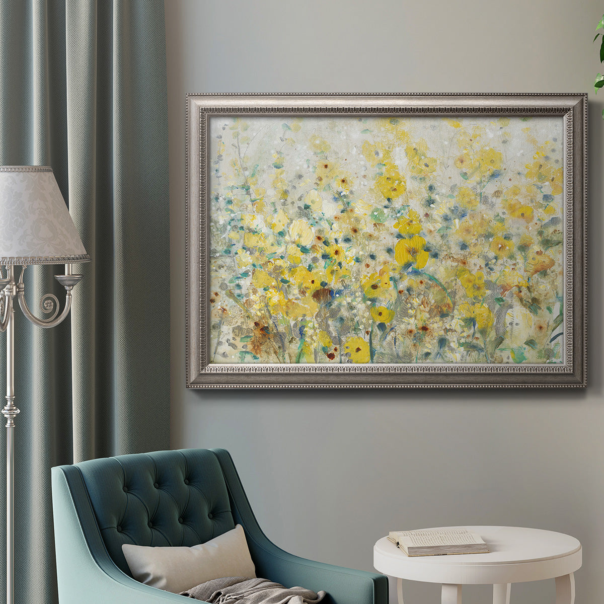French country floral garden artwork in an ornate vintage silver frame displayed in a neutral interior setting.