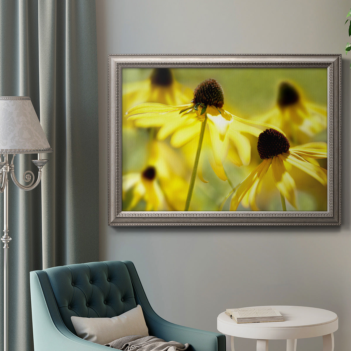 Modern floral Susan flower photography in an ornate vintage silver frame displayed in a neutral interior setting.