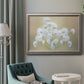 Botanical baby’s breath flower photography in an ornate vintage silver frame displayed in a neutral interior setting.