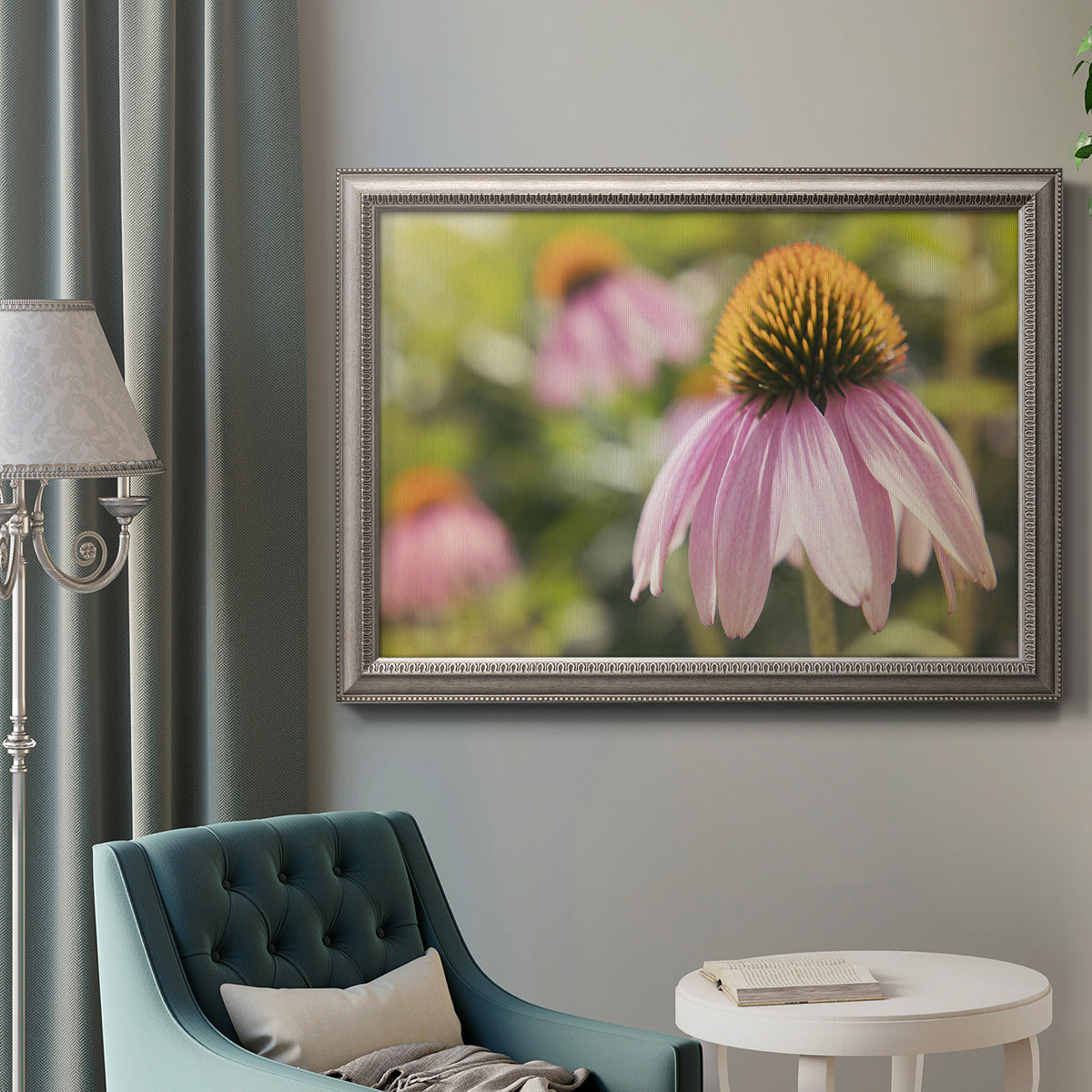 Echinacea flower botanical photography in an ornate vintage silver frame displayed in a neutral interior setting.