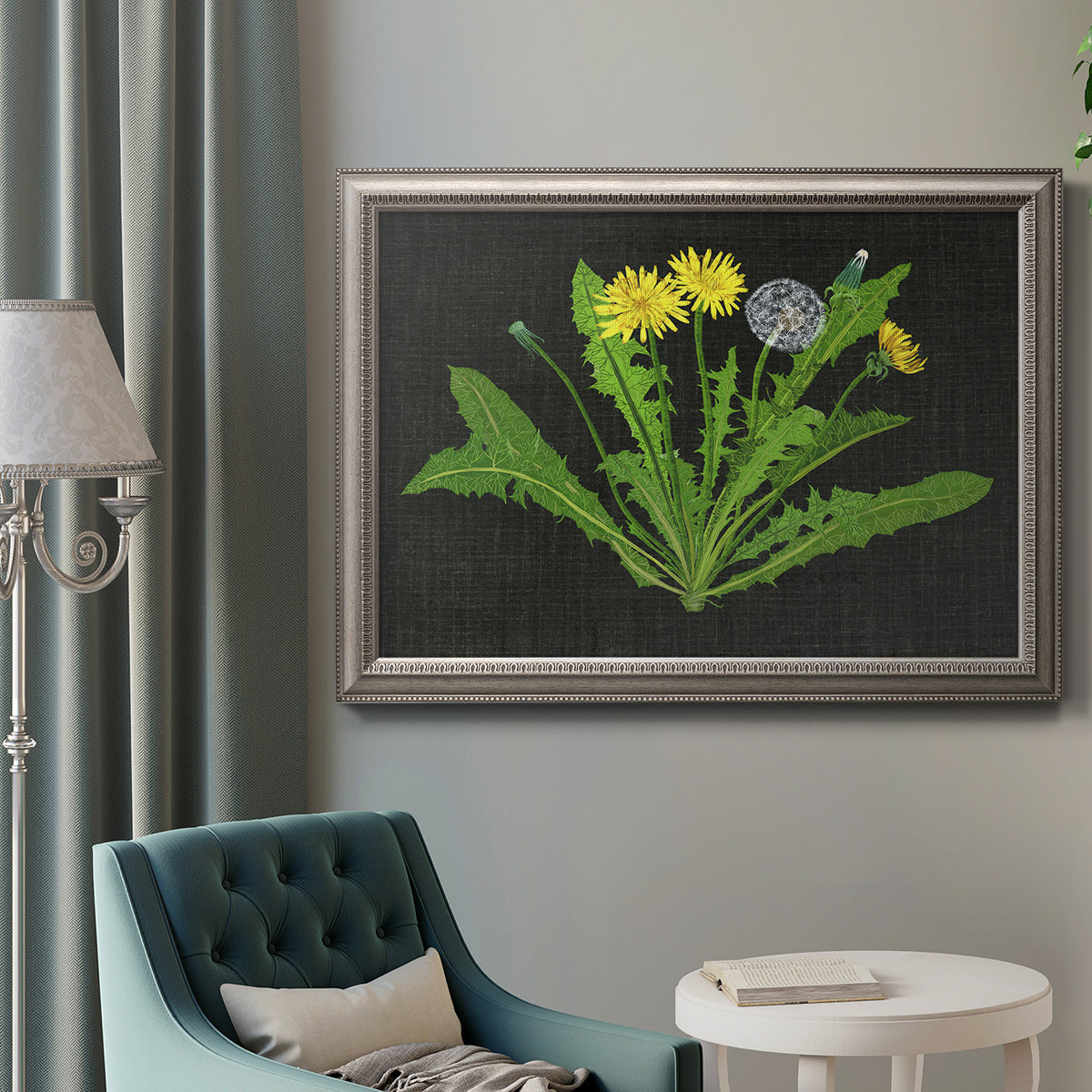 Classic botanical dandelion illustration in an ornate vintage silver frame displayed in a neutral interior setting.