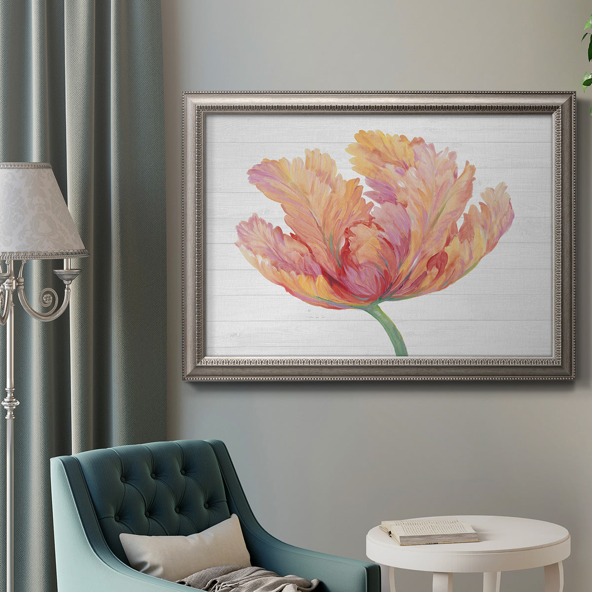 Modern minimalist pink floral artwork in an ornate vintage silver frame displayed in a neutral interior setting.