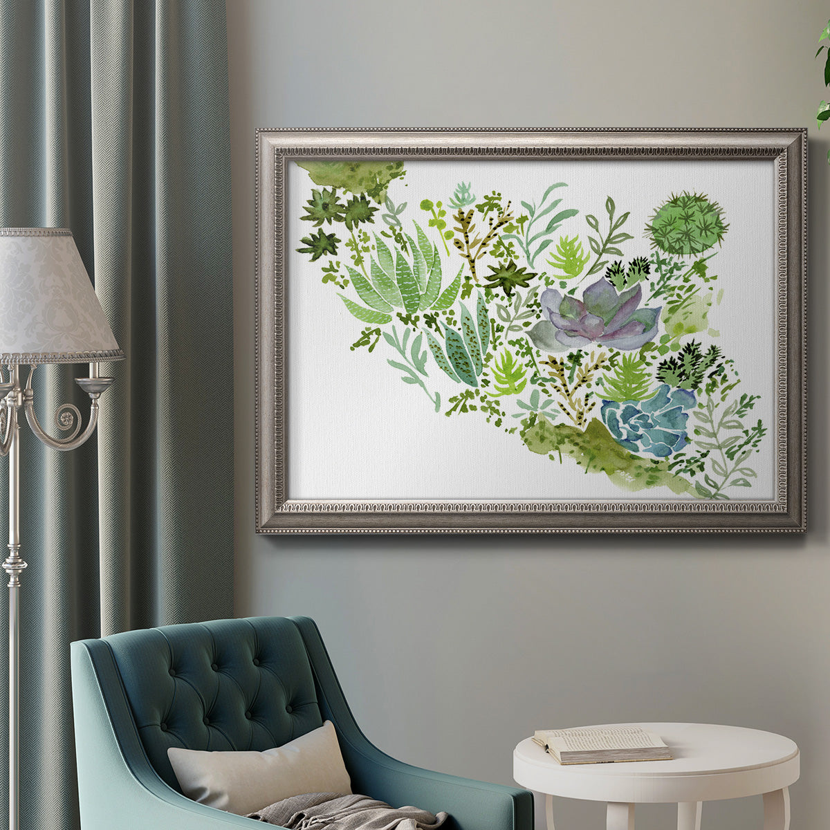 Contemporary abstract succulent botanical watercolor in an ornate vintage silver frame displayed in a neutral interior setting.