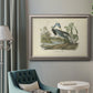 Antique Louisiana heron bird illustration by John James Audubon in an ornate vintage silver frame displayed in a neutral interior setting.