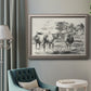 Classical rural landscape artwork by Nicolas Berchem in an ornate vintage silver frame displayed in a neutral interior setting.