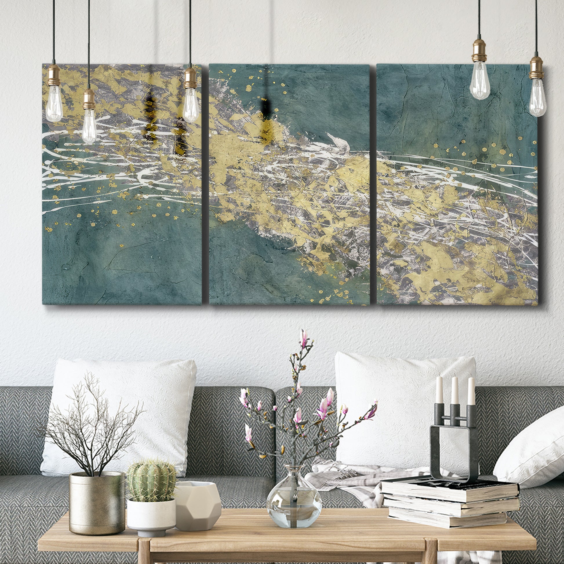Three-panel canvas wall art featuring soft abstract wind movement, displayed in a modern living room above seating.