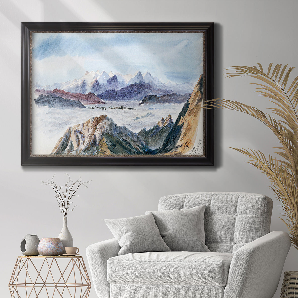 Impressionist alpine mountain landscape by John Singer Sargent in an ornate black frame with gilded inner detail displayed in a bright interior setting.