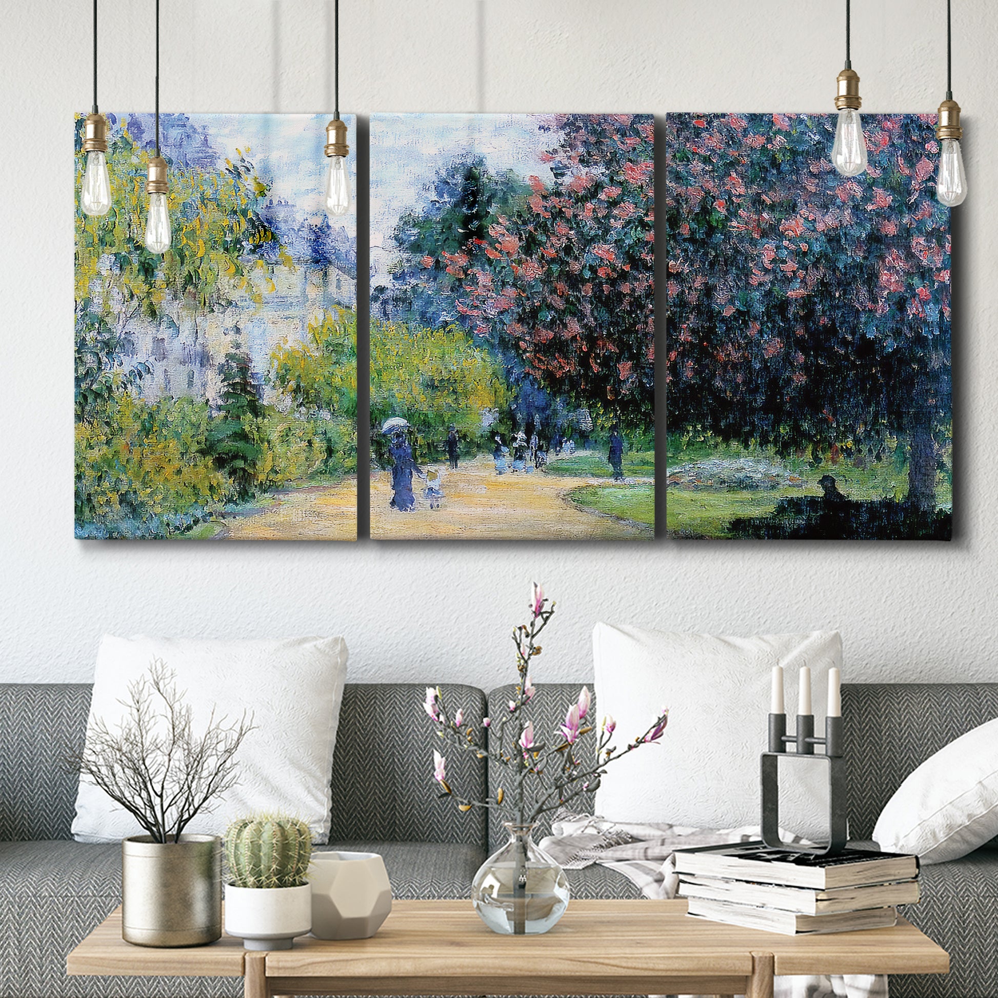 Three-panel canvas wall art featuring formal city park with trees, displayed in a modern living room above seating.