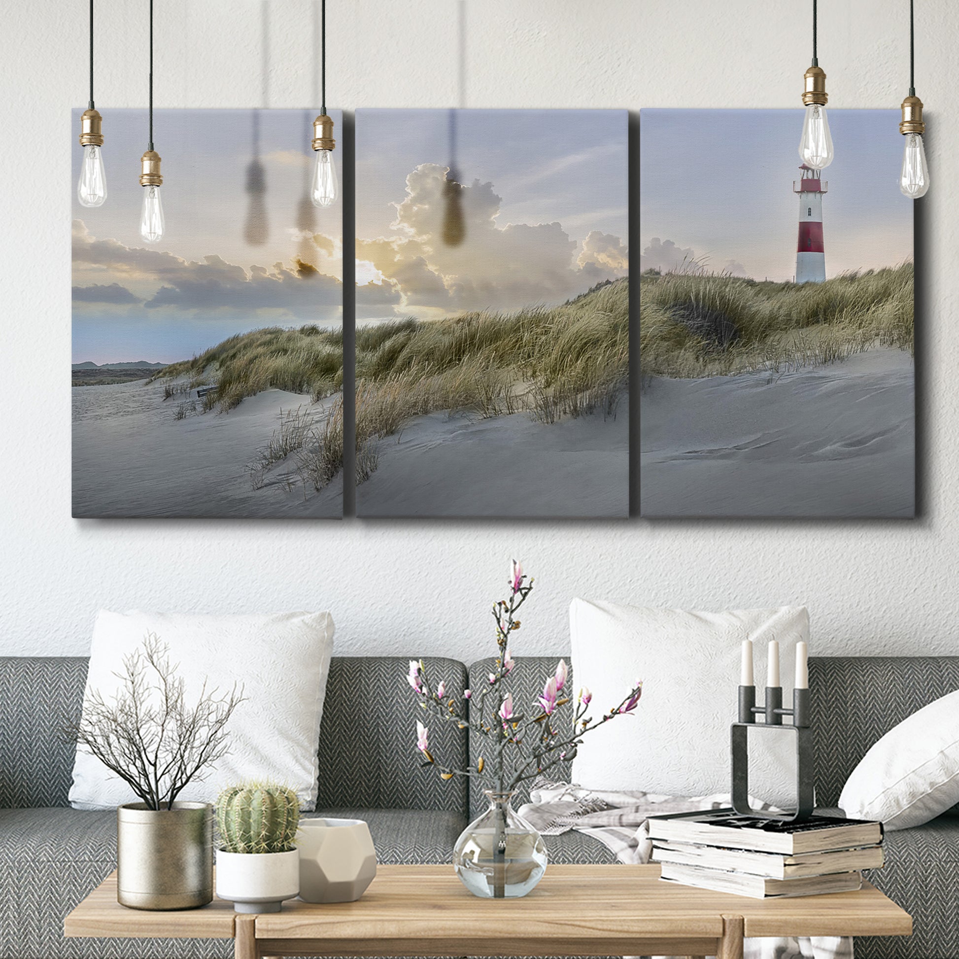 Three-panel canvas wall art featuring guardian boat along shoreline, displayed in a modern living room above seating.