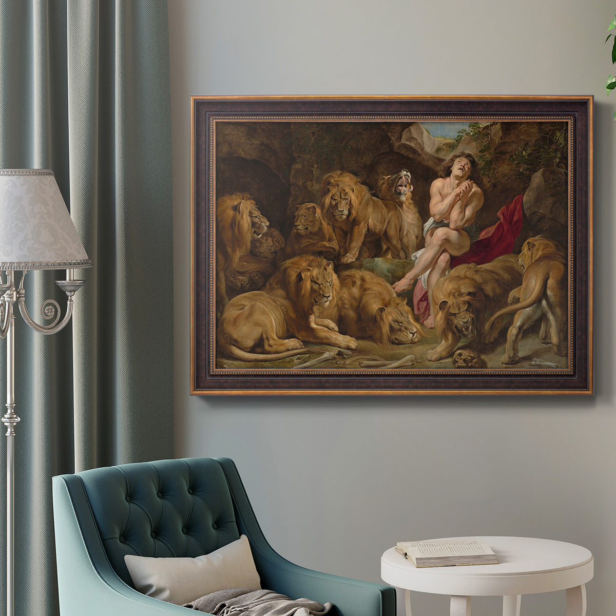 Dramatic biblical painting of Daniel with lions by Peter Paul Rubens in an ornate bronzed mahogany wood frame displayed in a bright interior setting.