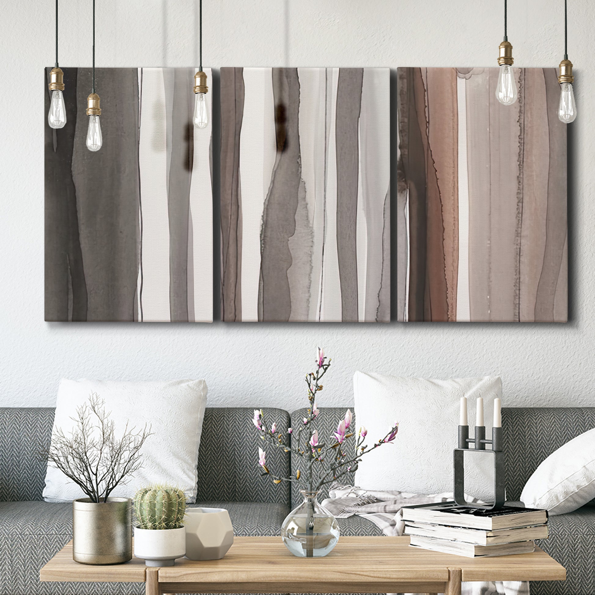 Three-panel canvas wall art featuring riverbank landscape with reflections, displayed in a modern living room above seating.