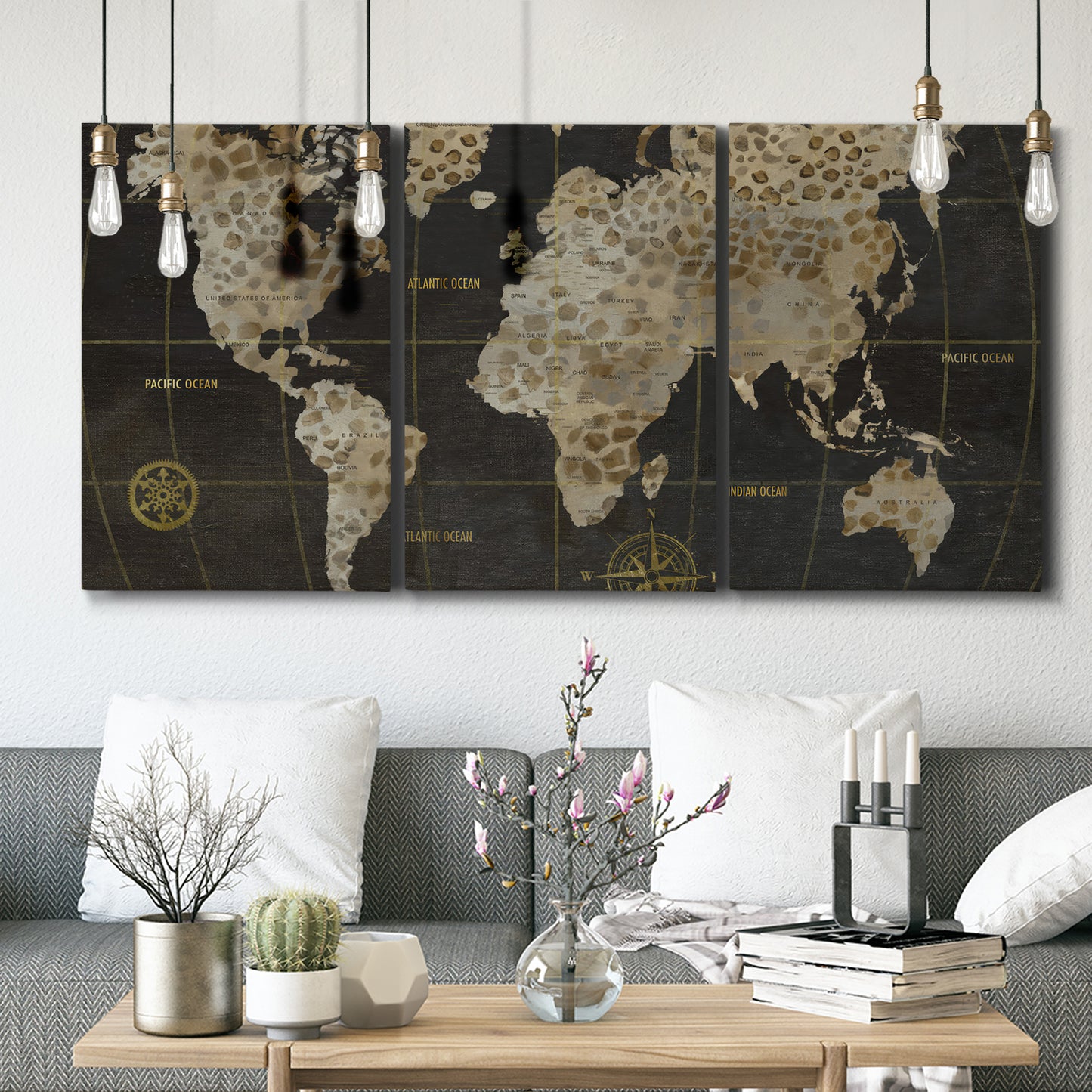 Three-panel canvas wall art featuring illustrated safari world map, displayed in a modern living room above seating.