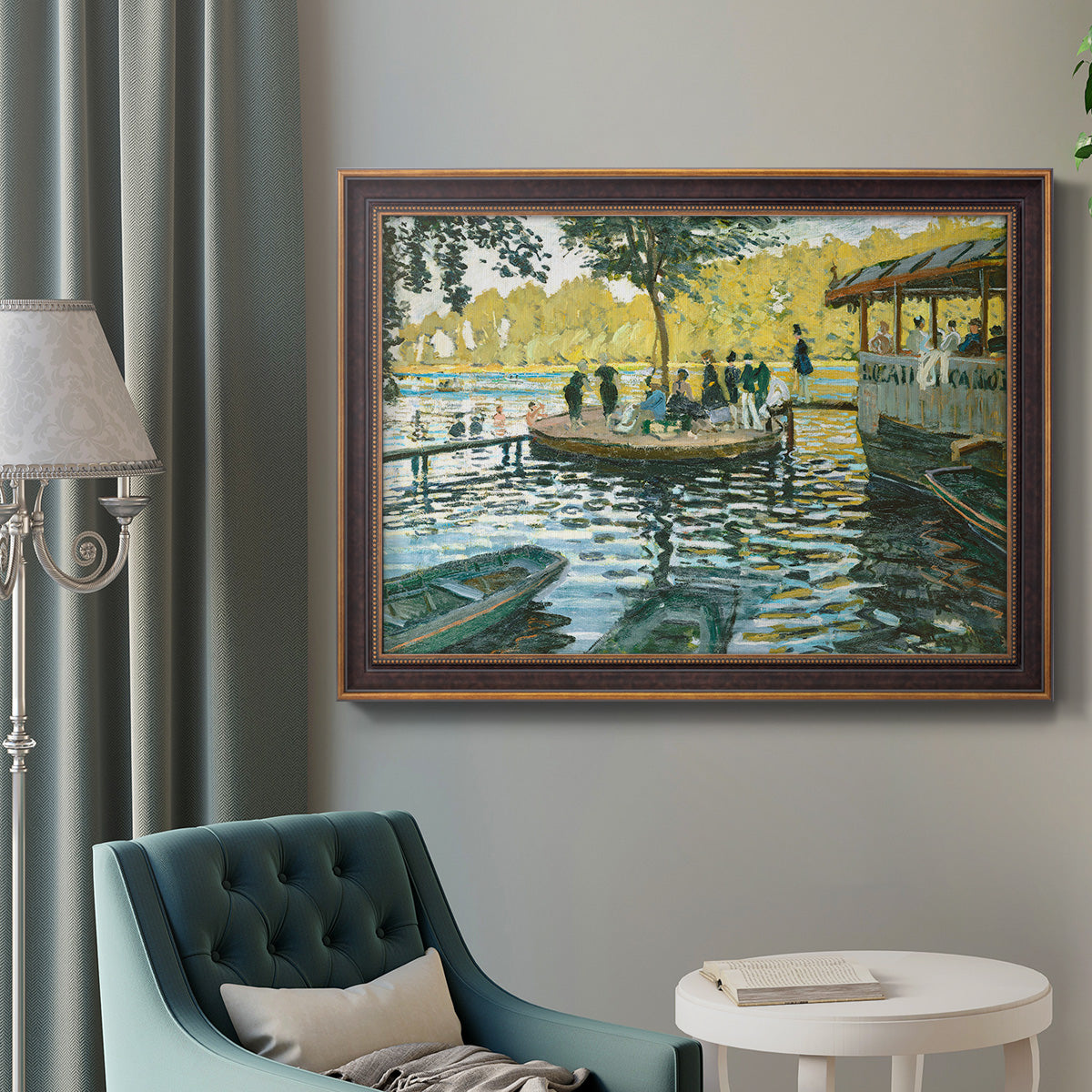 Impressionist riverside leisure scene by Claude Monet in an ornate bronzed mahogany wood frame displayed in a bright interior setting.