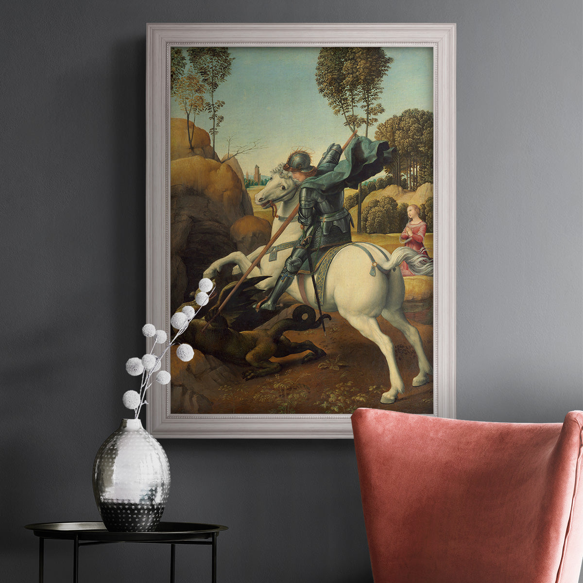 Religious painting of Saint George slaying the dragon by Raphael in an ornate weathered white frame displayed in a dark-toned interior setting.