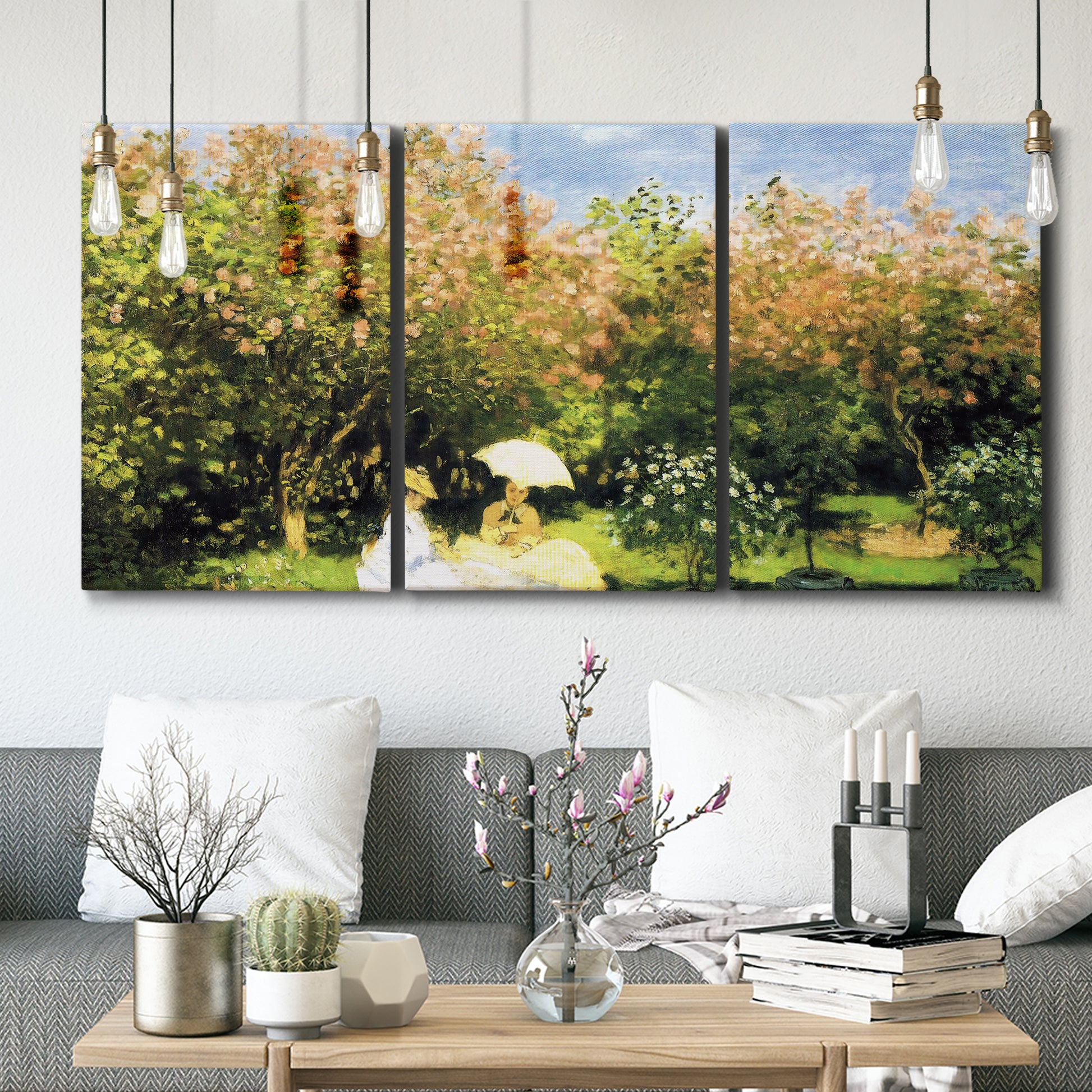 Three-panel canvas wall art featuring lush garden landscape with trees, displayed in a modern living room above seating.