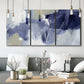 Three-panel canvas wall art featuring abstract sky break composition, displayed in a modern living room above seating.