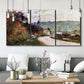 Three-panel canvas wall art featuring country road through village, displayed in a modern living room above seating.