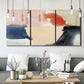 Three-panel canvas wall art featuring playful abstract watercolor shapes, displayed in a modern living room above seating.
