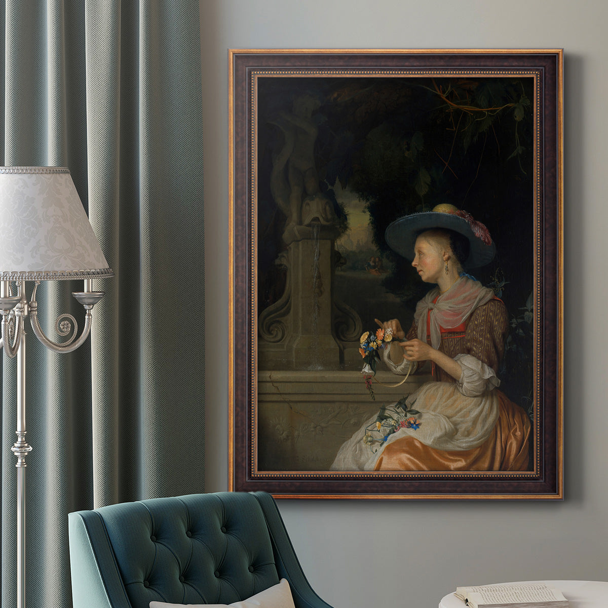 Classical interior scene of a woman weaving flowers by Godfried Schalcken in an ornate bronzed mahogany wood frame displayed in a dark-toned interior setting.