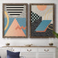 Set of two walnut barnwood framed canvas prints depicting a coordinated art pair of bold geometric Memphis-style patterns rendered as retro graphic abstracts above a dining room sideboard.
