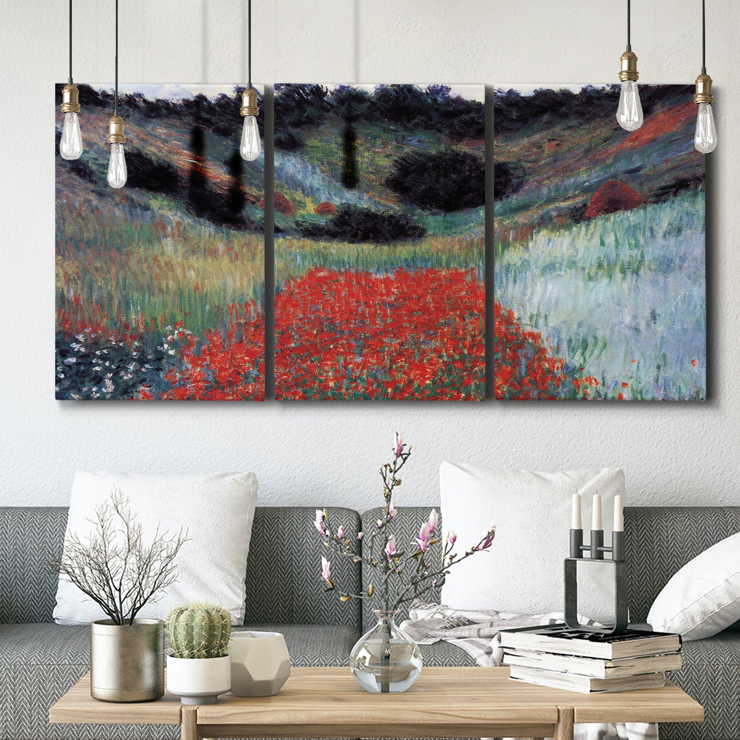 Three-panel canvas wall art featuring poppy field in shallow valley, displayed in a modern living room above seating.