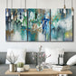 Three-panel canvas wall art featuring joyful abstract color harmony, displayed in a modern living room above seating.