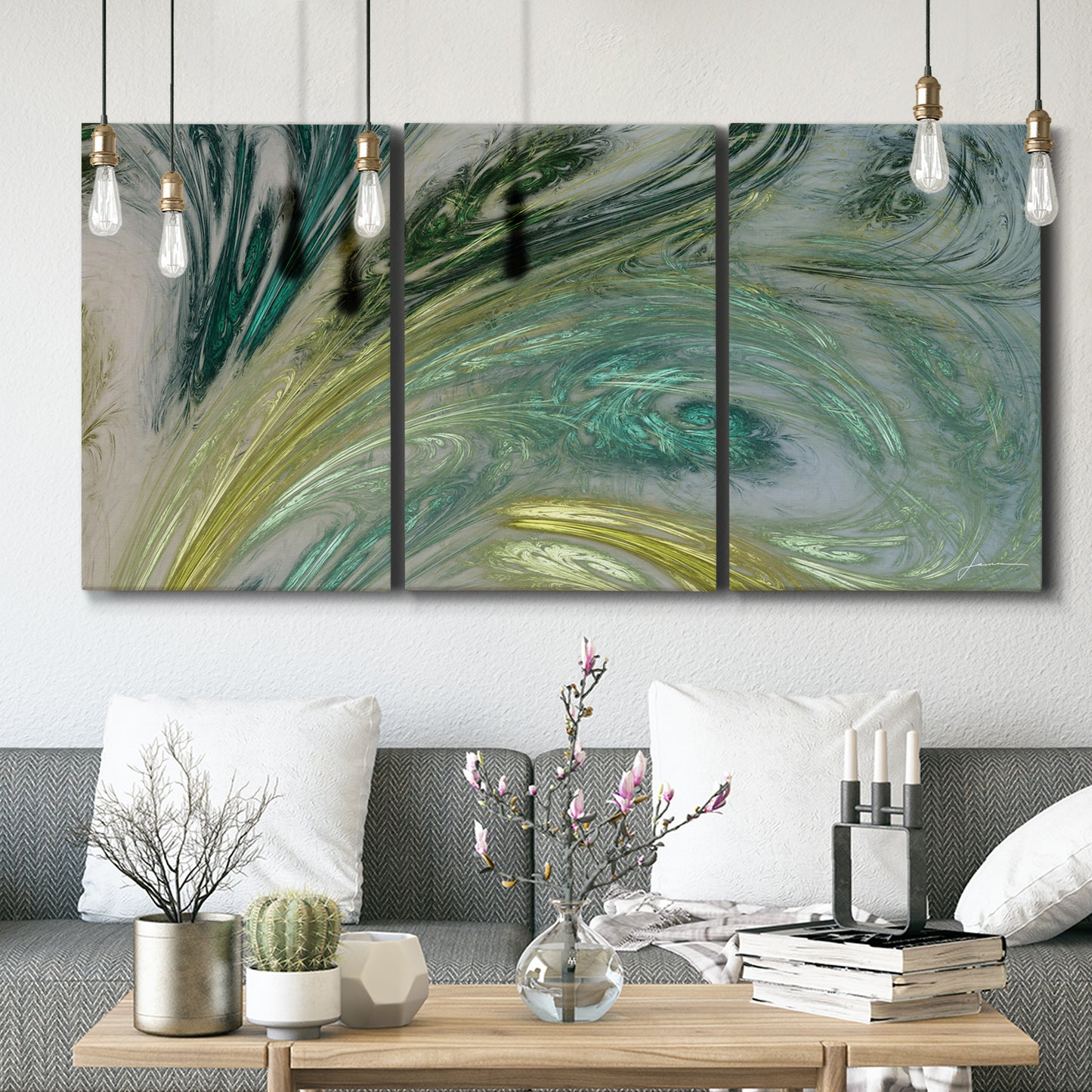 Three-panel canvas wall art featuring layered modern abstract landscape, displayed in a modern living room above seating.