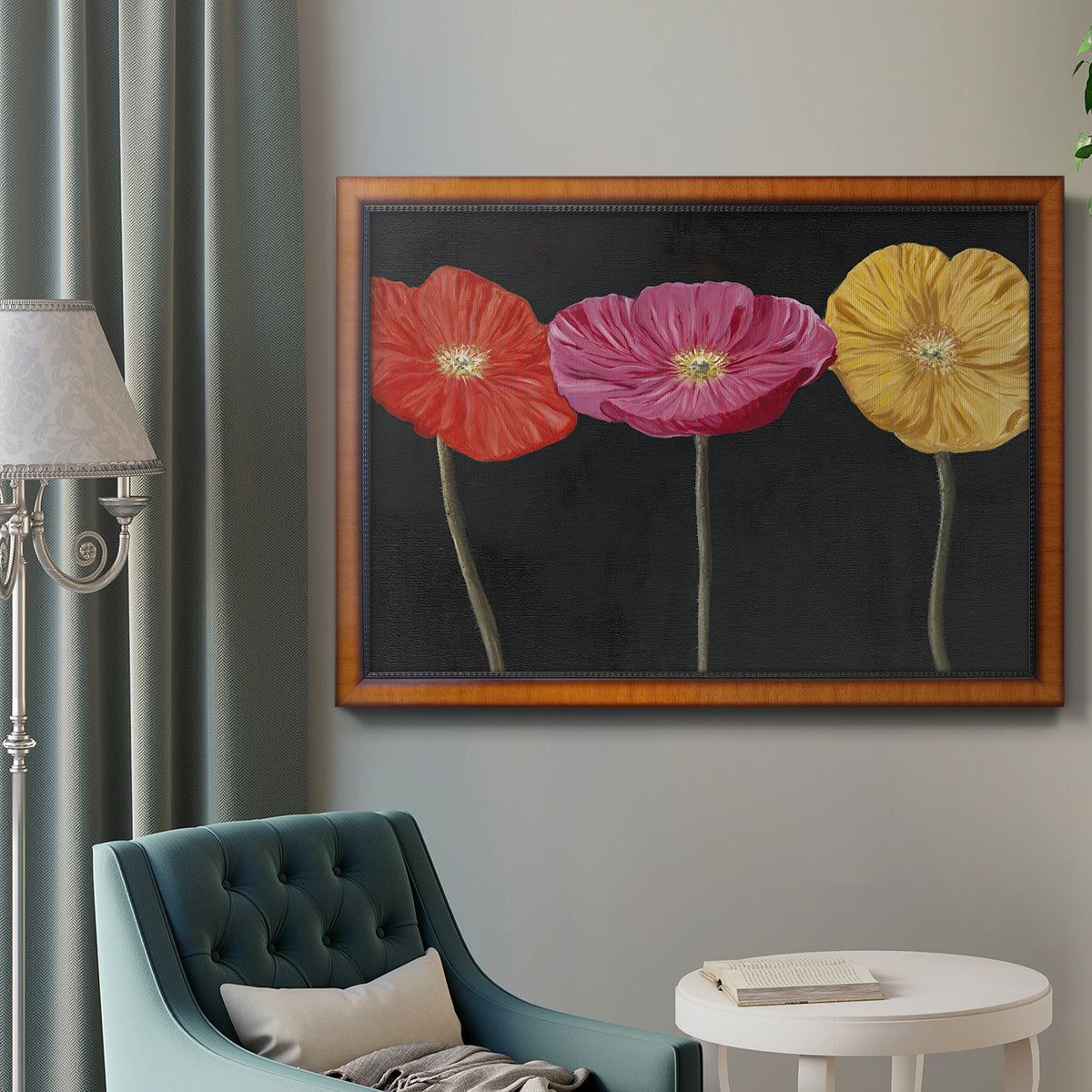 Contemporary poppy flower artwork in an ornate vintage burl wood frame displayed in a neutral interior setting.