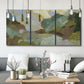 Three-panel canvas wall art featuring abstract landscape suggesting travel pause, displayed in a modern living room above seating.